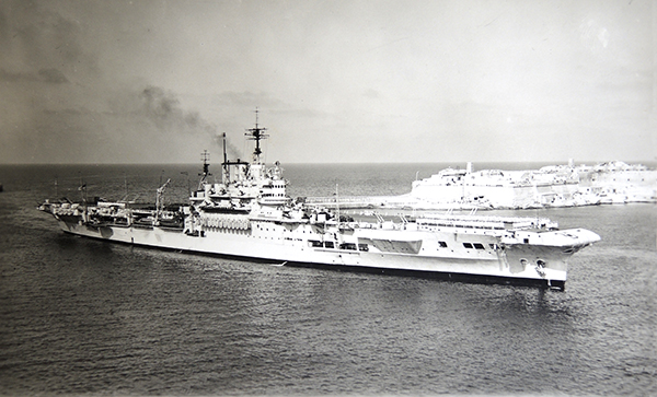 R Formidable R 67, an Illustrious-class aircraft carrier entering Valletta harbour in June 1946